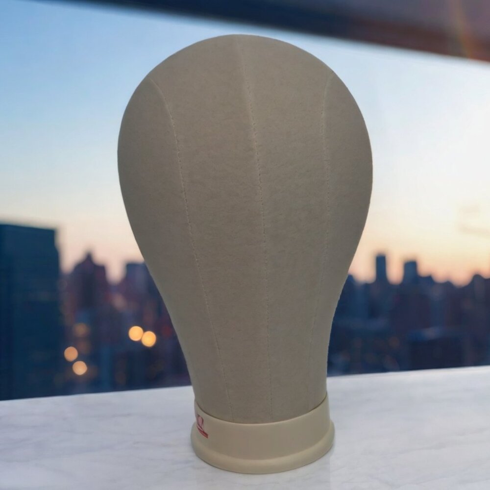 Mannequin head, canvas outside polyurethane inside.